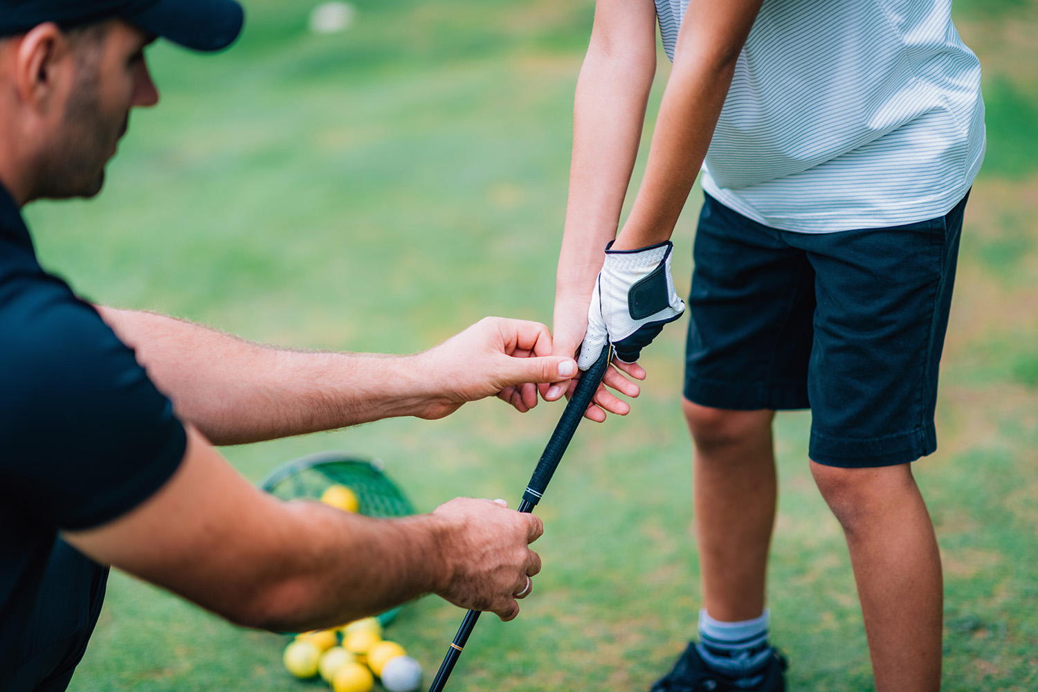 Golf kind en coach
