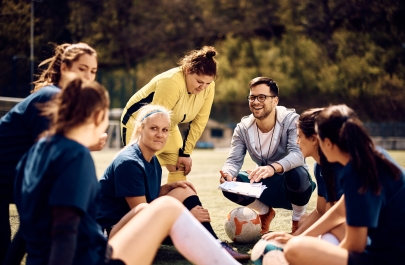 voetbal vrouwenteam met coach